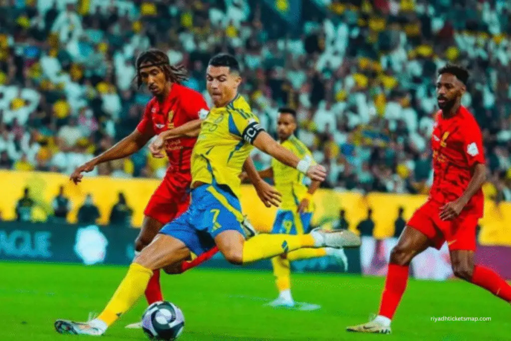 Al-Nassr Edge Arkadag 1-0 Without Ronaldo in AFC Champions League Two 7 Ronaldo kicking the ball - Damac vs Al Nassr